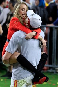MIAMI, FLORIDA - FEBRUARY 02: Patrick Mahomes #15 of the Kansas City Chiefs celebrates with his girlfriend Brittany Matthews after defeating San Francisco 49ers by 31 - 20 in Super Bowl LIV at Hard Rock Stadium on February 02, 2020 in Miami, Florida. (Photo by Andy Lyons/Getty Images)