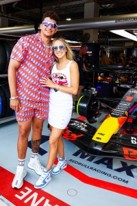 MIAMI, FLORIDA - MAY 07: Patrick Mahomes and Brittany Mahomes  pose for a photo outside the Red Bull Racing garage prior to the F1 Grand Prix of Miami at Miami International Autodrome on May 07, 2023 in Miami, Florida. (Photo by Mark Thompson/Getty Images)