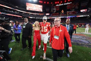 LAS VEGAS, NEVADA - FEBRUARY 11: Patrick Mahomes #15 of the Kansas City Chiefs and his wife, Brittany Mahomes, walk on the field after defeating the San Francisco 49ers 25-22 in overtime during Super Bowl LVIII at Allegiant Stadium on February 11, 2024 in Las Vegas, Nevada. (Photo by Ezra Shaw/Getty Images)