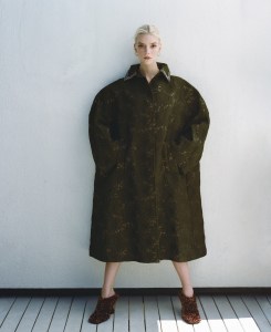 Max Mara Atelier silk and metallic fiber blend coat; Dries Van Noten shoes; Jean Schlumberger by Tiffany Apollo ear clips in gold with diamonds in platinum.