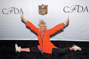 NEW YORK, NY - JANUARY 20:  Designer Betsey Johnson does a split on the carpet as the NFL Unveils Super Bowl 50 Bespoke Designer Footballs in Collaboration with the CFDA at NFL Headquarters on January 20, 2016 in New York City.  (Photo by D Dipasupil/FilmMagic)