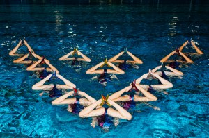 Artistic swimmers from France's national team rehearsing in Christian Louboutin pumps.