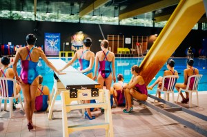 Artistic swimmers from France's national team rehearsing in Christian Louboutin pumps.