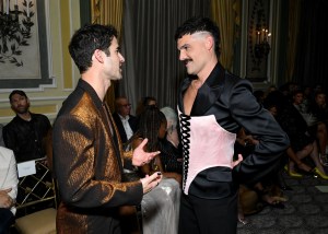 Darren Criss and Cody Belew at the Christian Siriano Spring 2025 ready-to-wear show.