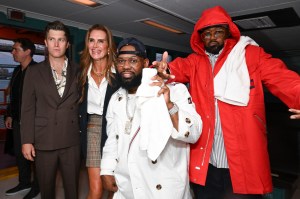 Colin Jost, Brooke Shields, Raekwon and Ghostface Killah at the Tommy Hilfiger Spring 2025 Ready-to-Wear show.