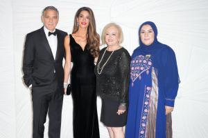 George Clooney, Amal Clooney, Reem Soud Jebreen Alhajara, Hyam Tanus at The Albies, Clooney Foundation for Justice - Arrivals on September 26, 2024 in New York, New York.