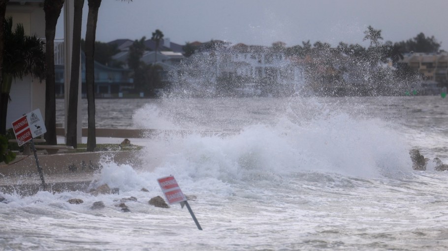 Waves from the Gulf of Mexico crash on shore as Hurricane Helene churns offshore on September 26, 2024 in St. Pete Beach, Fla.