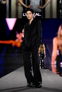 PARIS, FRANCE - SEPTEMBER 23: PP Krit walks the runway during "Le Défilé L'Oréal Paris – Walk Your Worth" Womenswear Spring-Summer 2025 show as part of Paris Fashion Week on September 23, 2024 in Paris, France. (Photo by Kristy Sparow/Getty Images for L'Oréal Paris)