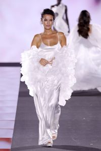 PARIS, FRANCE - SEPTEMBER 23: (EDITORIAL USE ONLY - For Non-Editorial use please seek approval from Fashion House) Pinar Deniz walks the runway during "Le Défilé L'Oréal Paris – Walk Your Worth" Womenswear Spring-Summer 2025 show as part of Paris Fashion Week on September 23, 2024 in Paris, France. (Photo by Pascal Le Segretain/Getty Images)