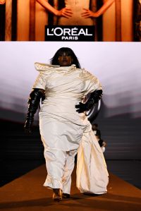 PARIS, FRANCE - SEPTEMBER 23: Yseult walks the runway during "Le Défilé L'Oréal Paris – Walk Your Worth" Womenswear Spring-Summer 2025 show as part of Paris Fashion Week on September 23, 2024 in Paris, France. (Photo by Kristy Sparow/Getty Images for L'Oréal Paris)