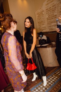Emily Ratajkowski cackstage at the Proenza Schouler Spring 2025 ready-to-wear show at New York Fashion Week.