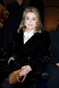Catherine Deneuve at the Saint Laurent Spring 2025 ready-to-wear show
