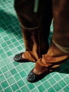 A preview of the Tory Burch Spring 2025 collection, showing at the Domino Sugar Factory.