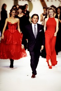 Valentino Garavani joins the models onstage at the finale of the Valentino Fall 1993 Ready to Wear Runway Show on March 18, 1993, in Paris, France.
