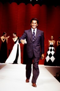Valentino Garavani greets the audience at the finale of the Valentino Fall 1993 Couture Runway Show on July 21, 1993, in Paris, France.