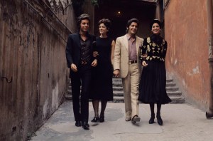 Valentino Garavani with models wearing outfits from his fall 1970 couture collection, circa July 1970.