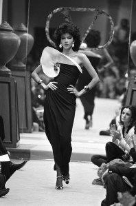 Dalma Callado on the runway in evening wear from Valentino's Spring 1983 haute couture fashion show.