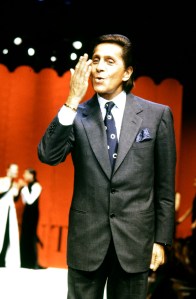 Valentino Garavani greets the audience at the finale of the Valentino Fall 1993 Couture Runway Show on July 21, 1993, in Paris, France.