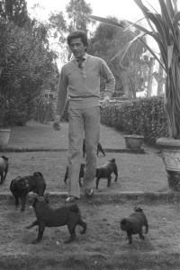 Valentino relaxes on the grounds of his Italian Villa just outside Rome, where he lived alone with a small crew of servants and his many pug dogs in 1978.