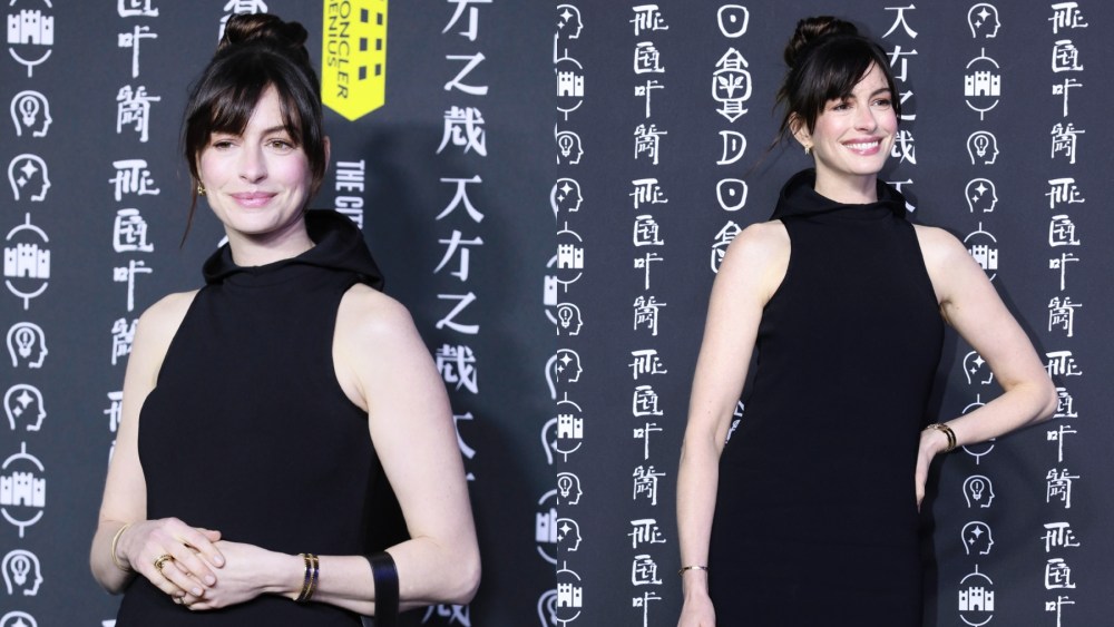 Anne Hathaway at Moncler's City of Genius event on Oct. 19 in Shanghai, red carpet, black sleeveless dress