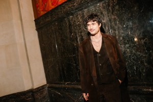 Charles Melton in Coach