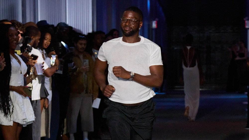 K.ngsley designer Kingsley Gbadegesin walks the runway for his fashion show finale.