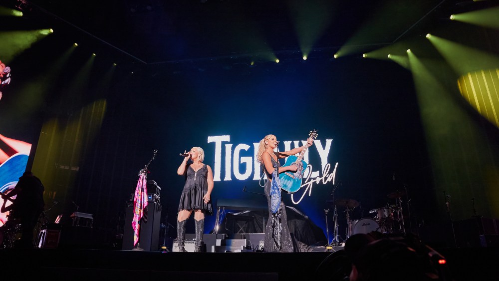 Kendra and Krista Slaubaugh, or Tigirlily Gold, on stage at Madison Square Garden.