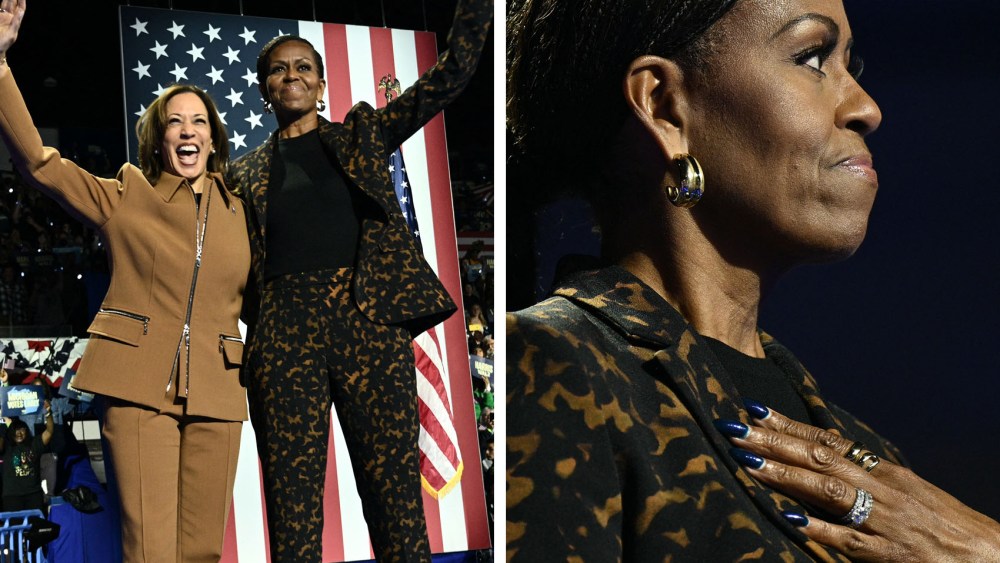 Democratic presidential candidate, U.S. Vice President Kamala Harris greets former first lady Michelle Obama during a campaign rally at the Wings Event Center on October 26, 2024 in Kalamazoo, Michigan, wedding ring, theory suit