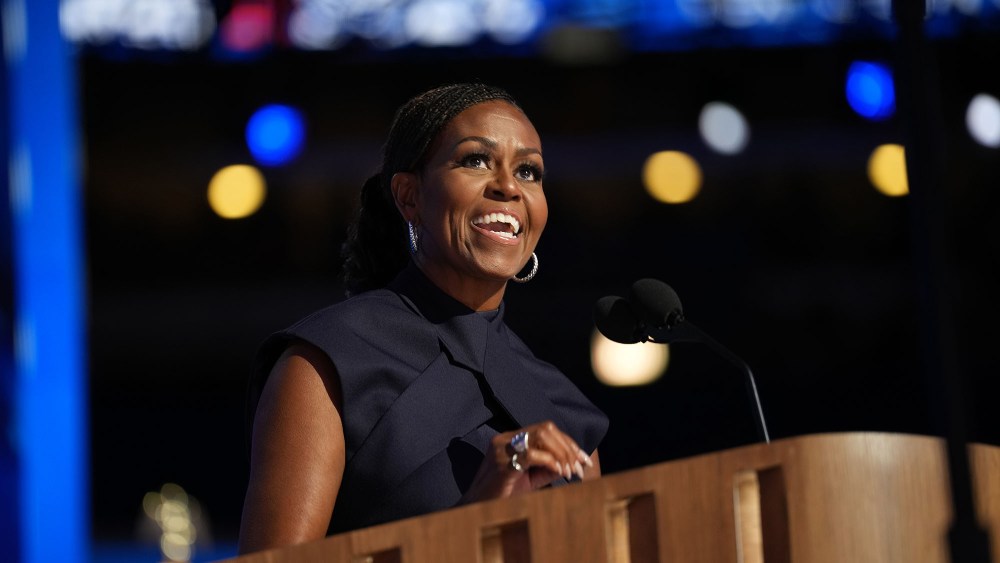 CHICAGO, ILLINOIS - AUGUST 20: Former first lady Michelle Obama speaks on stage during the second day of the Democratic National Convention at the United Center on August 20, 2024 in Chicago, Illinois. Delegates, politicians, and Democratic Party supporters are gathering in Chicago, as current Vice President Kamala Harris is named her party's presidential nominee. The DNC takes place from August 19-22. (Photo by Andrew Harnik/Getty Images)