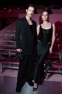 Nelson Tiberghien and Isabelle Chaput at the Victoria's Secret Fashion Show held at the Brooklyn Navy Yard on October 15, 2024 in New York, New York.