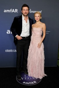 LAS VEGAS, NEVADA - NOVEMBER 22: (L-R) Brandon Sklenar and Julia Schlaepfer attend amfAR Las Vegas Presented By Paramount at Wynn Las Vegas on November 22, 2024 in Las Vegas, Nevada. (Photo by Ethan Miller/Getty Images for amfAR)