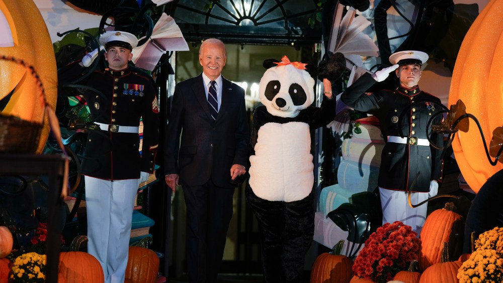 US President Joe Biden and First Lady Jill Biden greet trick-or-treaters during a Halloween event at the White House on October 30, 2024 in Washington, DC., jill biden panda outfit costume