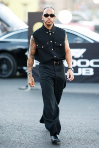 LAS VEGAS, NEVADA - NOVEMBER 21: Lewis Hamilton of Great Britain and Mercedes walks in the Paddock prior to practice ahead of the F1 Grand Prix of Las Vegas at Las Vegas Strip Circuit on November 21, 2024 in Las Vegas, Nevada. (Photo by Chris Graythen/Getty Images)