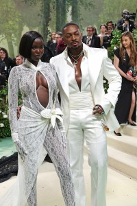 Adut Akech and LaQuan Smith attend The 2024 Met Gala Celebrating "Sleeping Beauties: Reawakening Fashion" at The Metropolitan Museum of Art on May 06, 2024 in New York City.