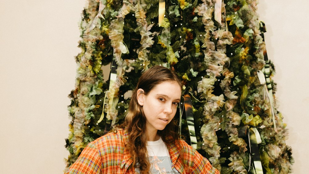 Hillary Taymour in front of the New York Edition holiday tree.
