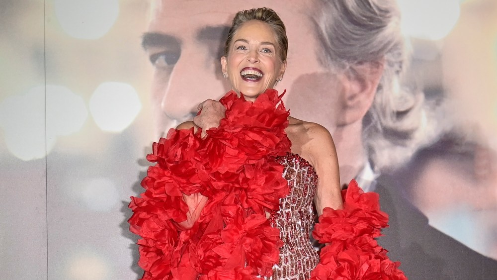 Sharon Stone wears a tony ward fall 2024 ruffled red wrap over a mosaic red gown, Sharon Stone attends the photocall for the Opening Red Carpet at the 42nd Torino Film Festival 2024 on November 22, 2024 in Turin, Italy.