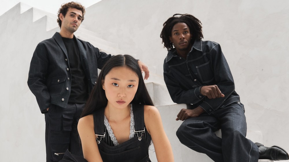 Three models pose in upcycled denim from Uniqlo's collaboration with FIDM.