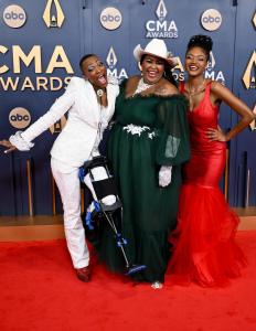 Trea Swindle, Danica Hart, Devynn Hart of Chapel Hart at The 58th Annual CMA Awards at Bridgestone Arena on November 20, 2024 in Nashville, Tennessee.