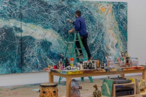 José Parlá painting onsite at PAMM.