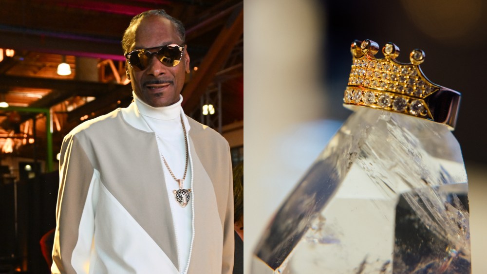 Snoop Dogg stands next to a gold crown-shaped ring from his jewelry line Lovechild.