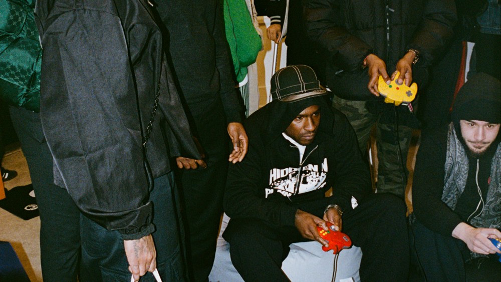 Skepta playing Mario Kart at the pop-up.