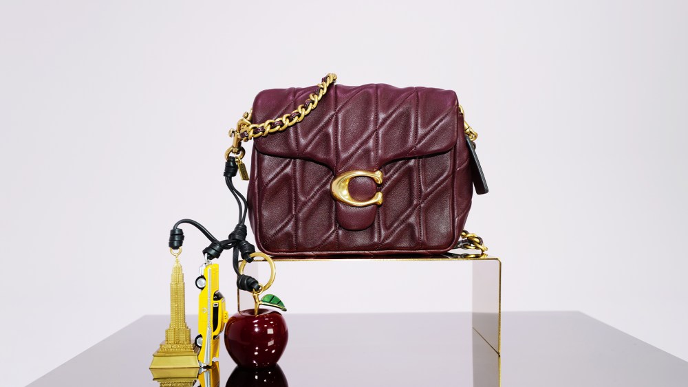burgundy coach bag with charms