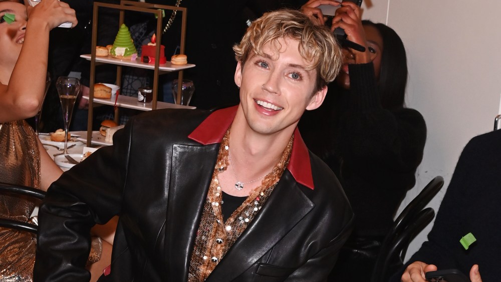 Troye Sivan enjoys Christmas Confetti spectacle at Selfridges.