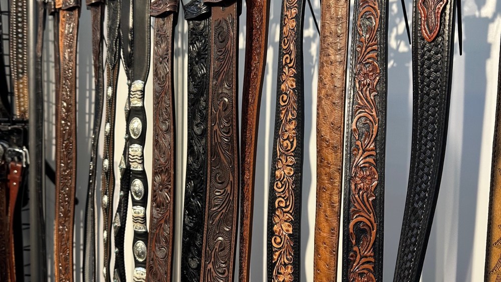 Christmas trees designed by Sir Paul Smith, Louis Vuitton and Sandra Choi, from left to right.