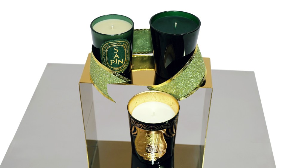 black candle with gold label