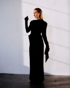 Balenciaga stretch crepe cape gown (available at Bergdorf Goodman); Stylist’s own gloves; Stella McCartney pumps.