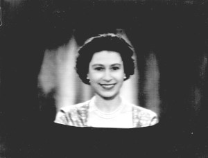 Queen Elizabeth ll delivers her Christmas speech  at Buckingham Palace on December 25, 1957 in London, England.  The Queen's Christmas Speech in 2007 marks the 50th anniversary of her first televised Noel Message.