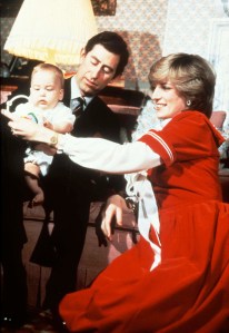 Princess Diana, Princess of Wales and Prince Charles, Prince of Wales pose with their baby son Prince William during the Christmas season at Kensington Palace on December 01, 1982 in London, England.