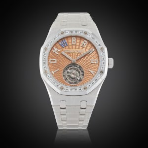 A piece with white gold and diamond-set flying tourbillon wristwatch with bracelet. It was owned and worn by Brady in Netflix’s "Greatest Roast of All Time: The Roast of Tom Brady."