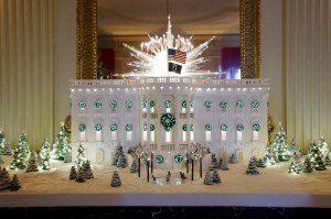 The Gingerbread White House is displayed in the State Dining Room during a media preview of the 2024 holiday decorations at the White House on December 02, 2024 in Washington, DC.